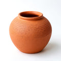 Jarrón Redondo Terracota — perfil lateral mostrando la silueta