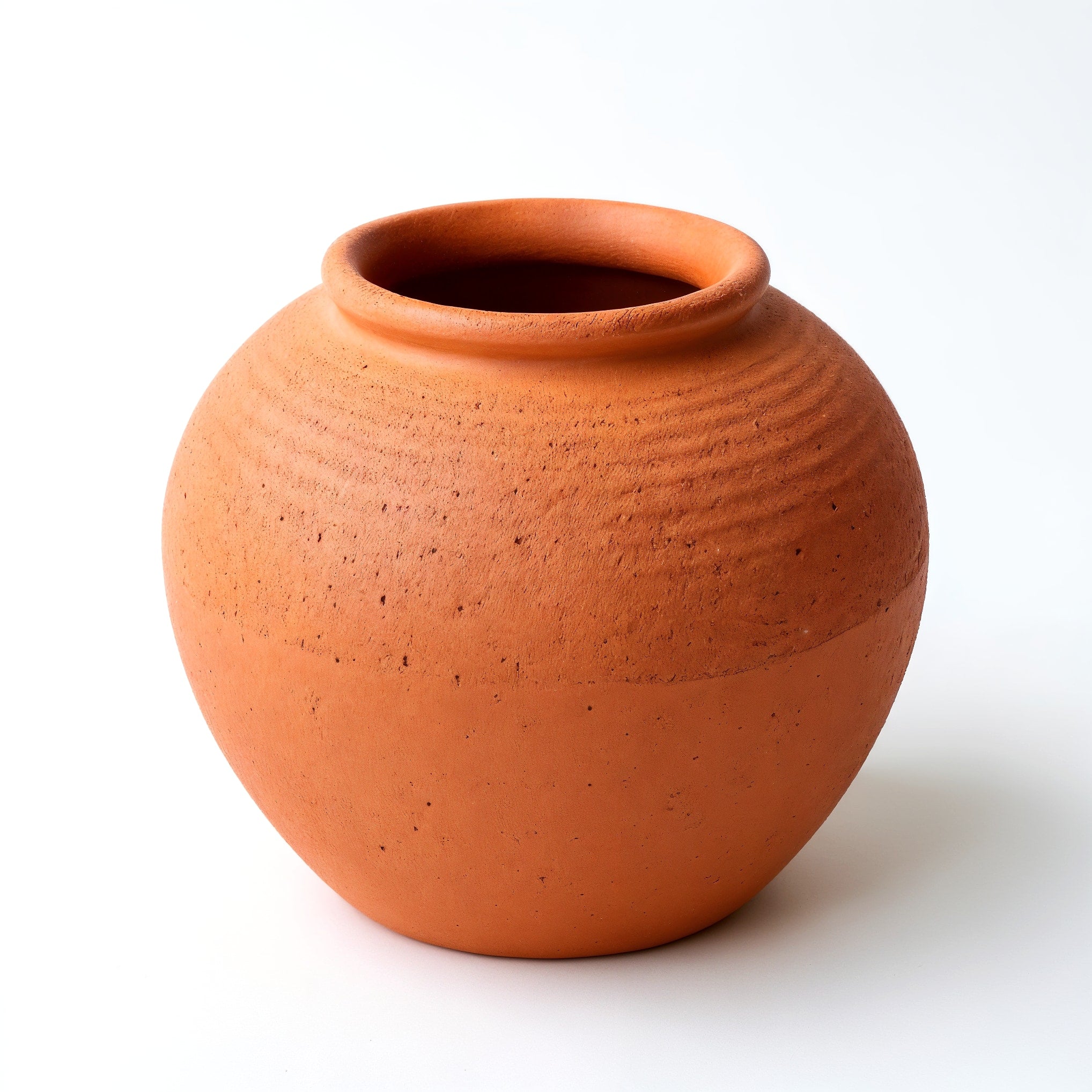 Jarrón Redondo Terracota — perfil lateral mostrando la silueta