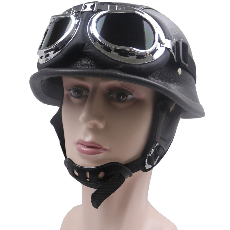 Casco de motocicleta de cuero vintage con gafas cromadas