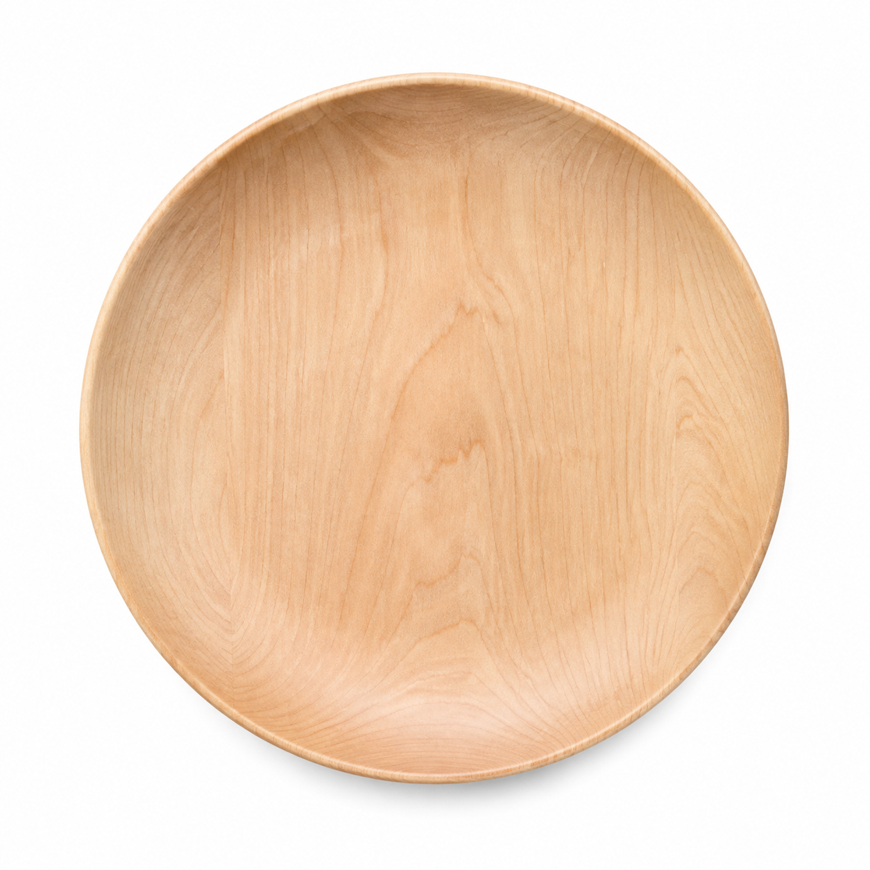 Plato redondo de madera visto desde arriba.