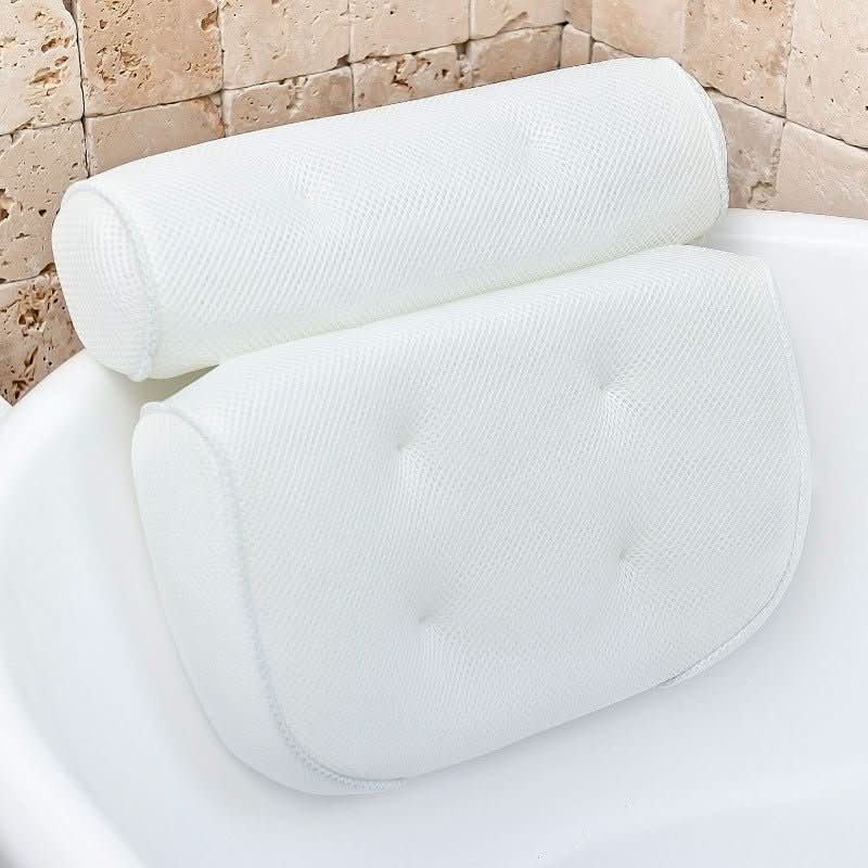 Cojín ergonómico para baño que proporciona soporte para el cuello y la cabeza en la bañera.