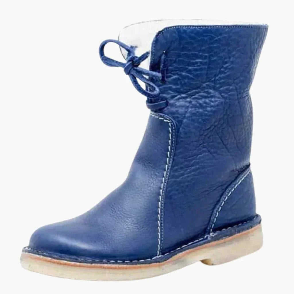 Botas de mujer con caña de altura media, cierre de cordones y superficie texturizada.