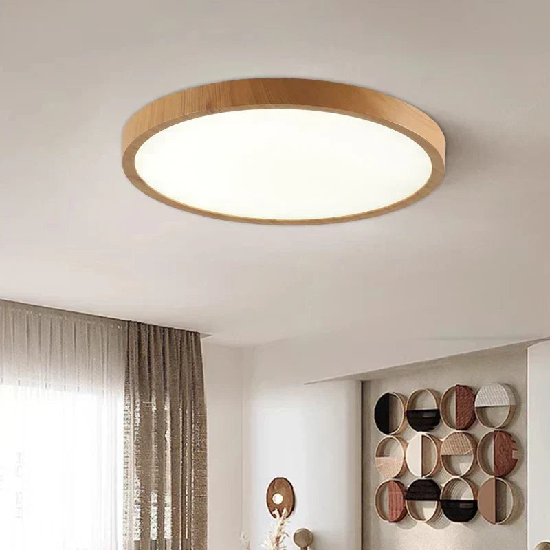 Lámpara de techo circular moderna con iluminación LED ajustable en acabado nogal cálido para sala de estar y dormitorio.