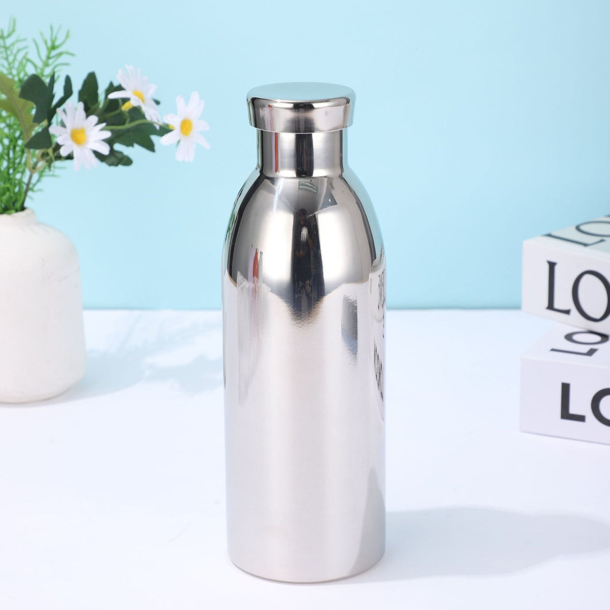 Botella de agua isotérmica de acero inoxidable para mujer