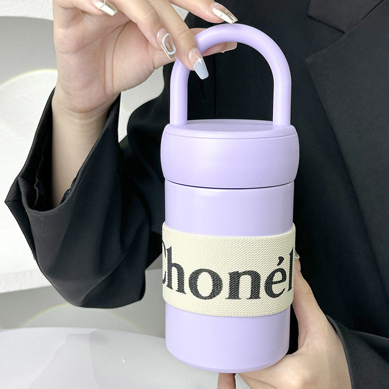Botella de agua isotérmica para mujer con asa ergonómica
