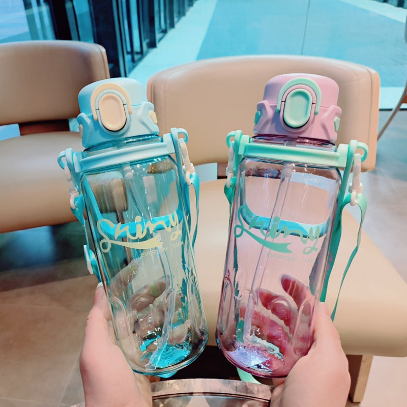 Botella de agua ergonómica para mujer con tapa a prueba de fugas