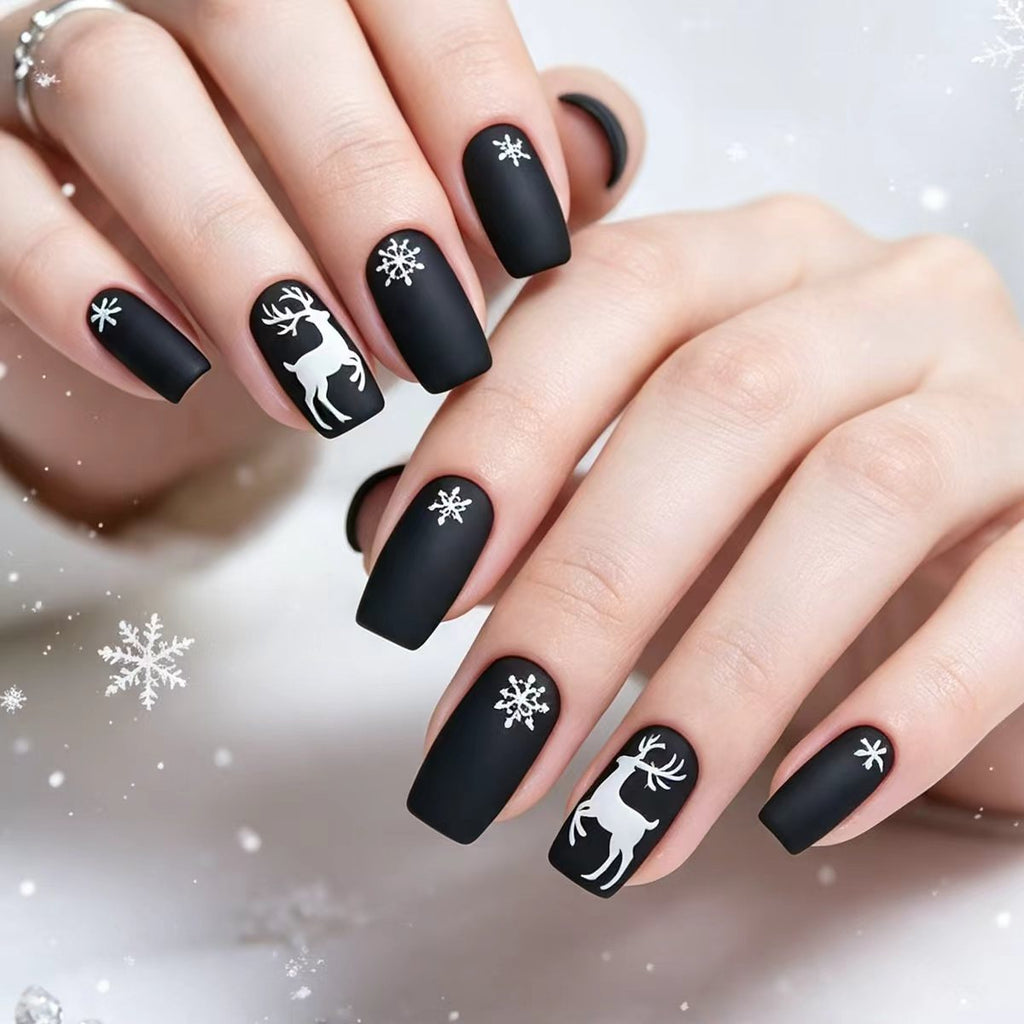 Arte de uñas artístico con temática navideña