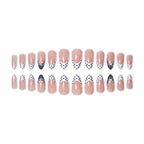 Extensiones de uñas con punta francesa y lunares elegantes