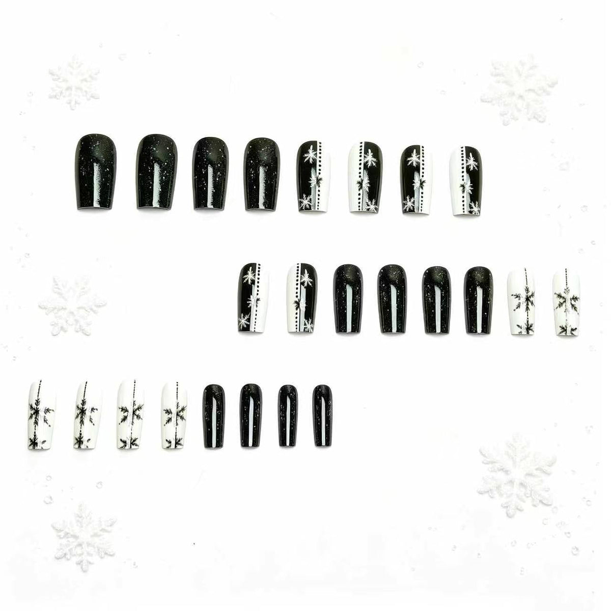 Elegante diseño de uñas con copos de nieve invernales