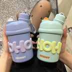 Botella de agua isotérmica para mujer con asa ergonómica y diseño alegre