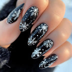 Arte de uñas con copos de nieve invernales artísticos