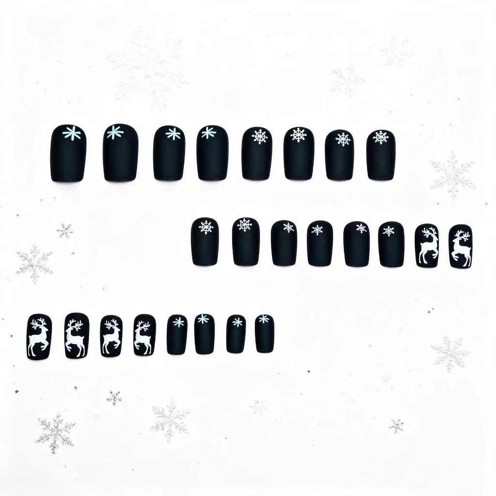 Arte de uñas artístico con temática navideña