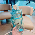 Botella de agua ergonómica para mujer con tapa a prueba de fugas