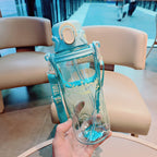 Botella de agua ergonómica para mujer con tapa a prueba de fugas