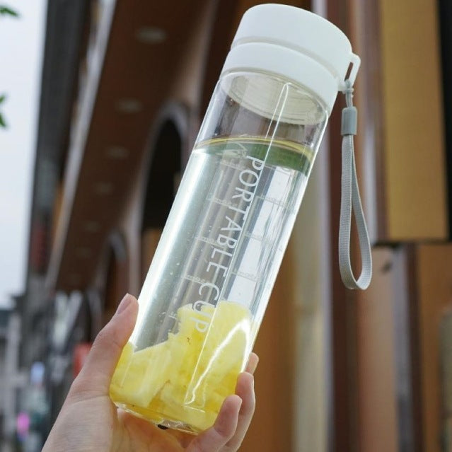Botella de agua portátil para mujer