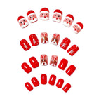 Diseño festivo de uñas en 3D de renos y Papá Noel