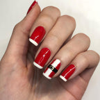 Diseño de uñas festivo con temática de Papá Noel