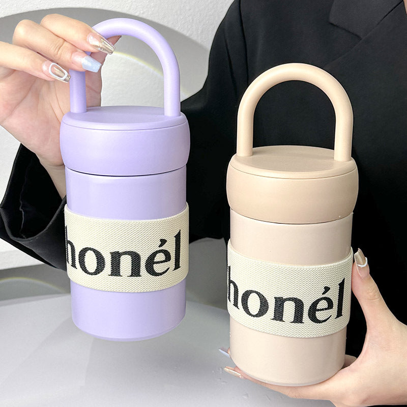 Botella de agua isotérmica para mujer con asa ergonómica