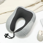 Almohada ergonómica de viaje para mujer con soporte cervical y superficie transpirable
