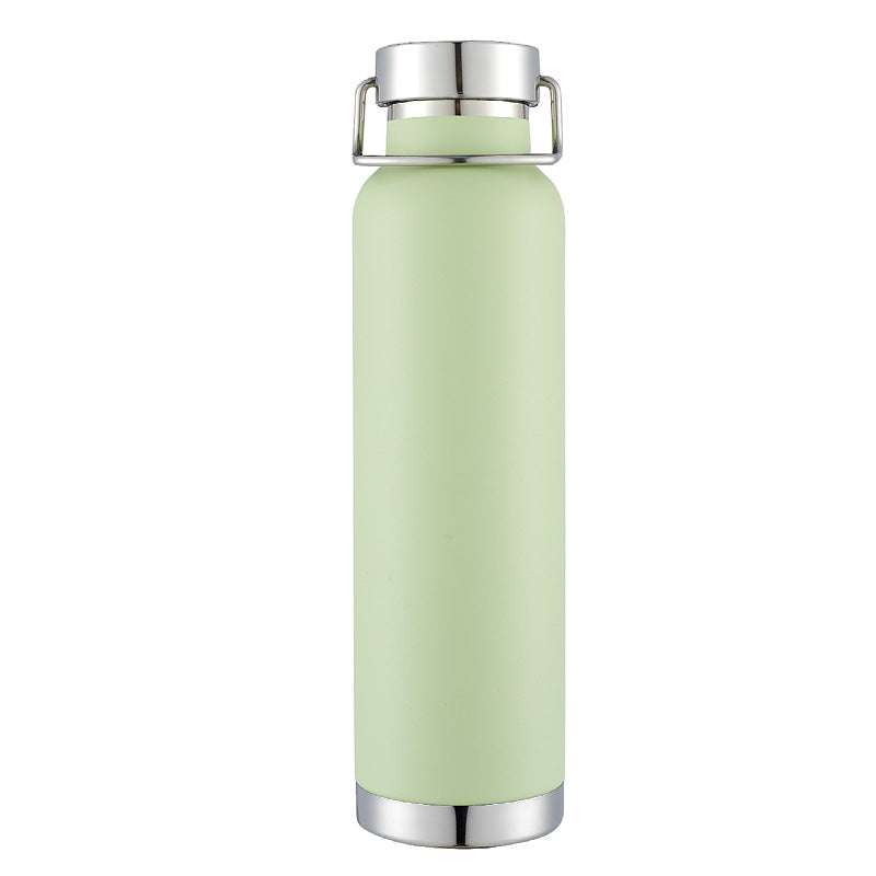 Botella de agua de acero inoxidable con doble pared y aislamiento al vacío, con tapa de transporte con cierre giratorio.