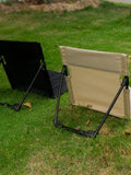 Silla plegable ultraligera para camping: asiento acolchado y comodidad portátil para exteriores.
