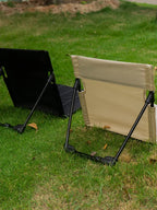 Silla plegable ultraligera para camping: asiento acolchado y comodidad portátil para exteriores.