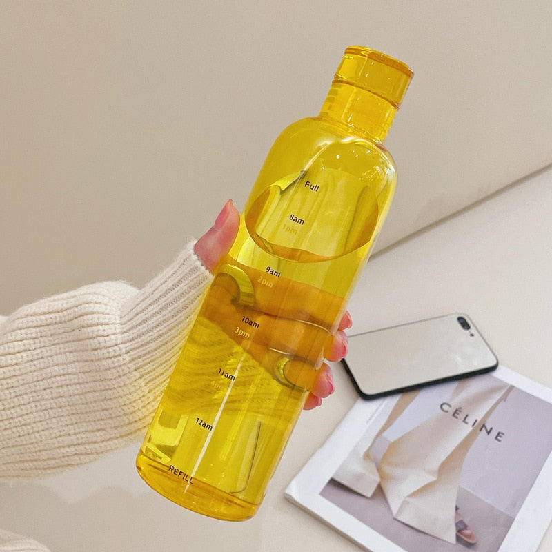 Botella de agua de vidrio resistente al calor con escala de tiempo