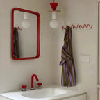 Perchero de pared de hierro fundido negro con diseño ondulado para recibidor, dormitorio o baño
