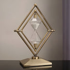 Reloj de arena con estructura geométrica de metal – Temporizador de meditación con arena blanca