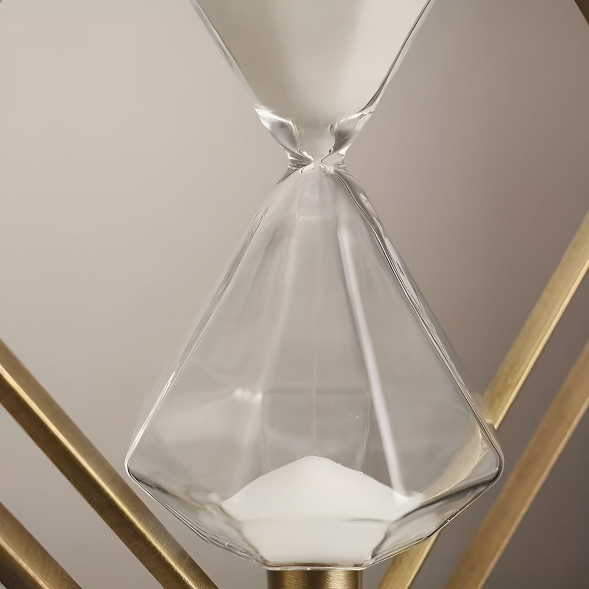 Reloj de arena con estructura geométrica de metal – Temporizador de meditación con arena blanca