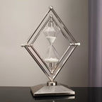Reloj de arena con estructura geométrica de metal – Temporizador de meditación con arena blanca