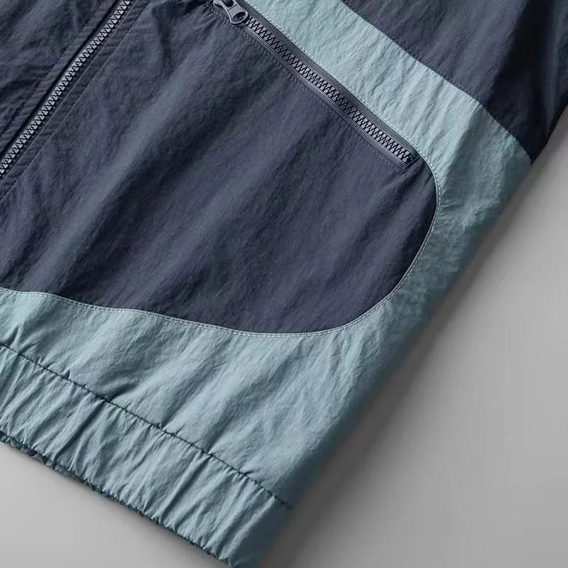 Chaqueta cortavientos Apex para hombre: estilo ligero y resistente a la intemperie.