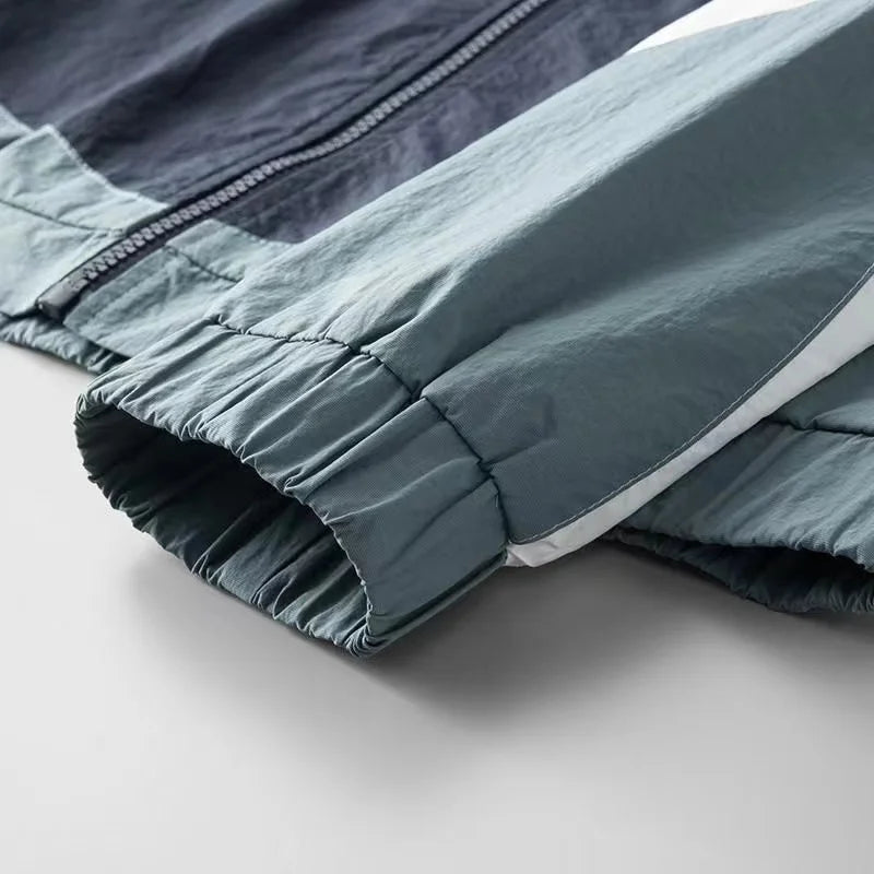 Chaqueta cortavientos Apex para hombre: estilo ligero y resistente a la intemperie.