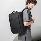 Mochila de viaje impermeable expandible 26–45 L con funda para portátil y opción de bolsa de deporte