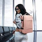 Mochila de viaje impermeable expandible 26–45 L con funda para portátil y opción de bolsa de deporte