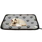 Almohadilla térmica eléctrica para mascotas (perro o gato) con protector de cable impermeable y control de temperatura.