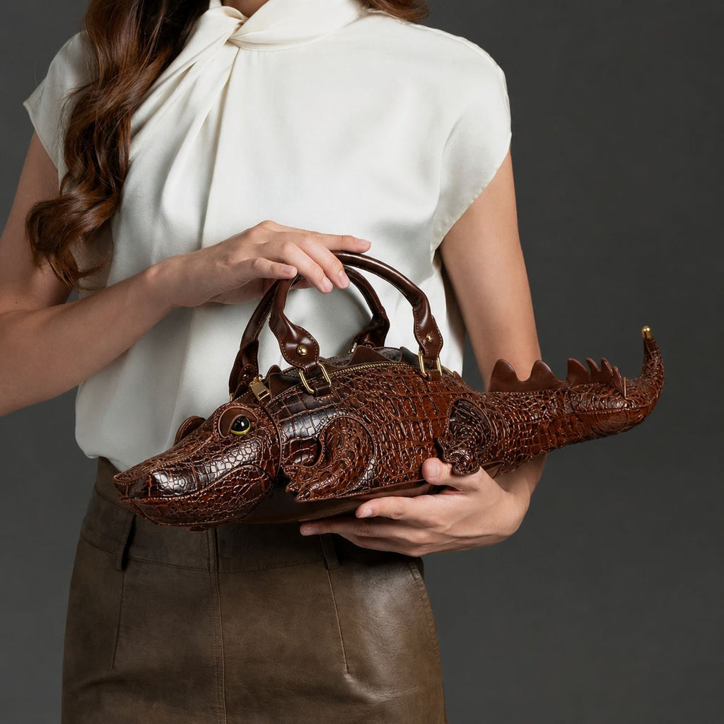 Bolso de mano con forma de cocodrilo