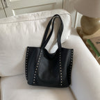 Bolso tote de piel con tachuelas