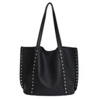 Bolso tote de piel con tachuelas