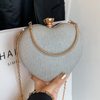Clutch de noche glamuroso con forma de corazón