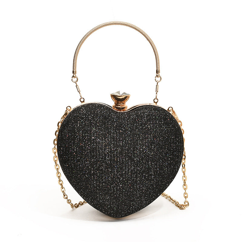 Clutch de noche glamuroso con forma de corazón