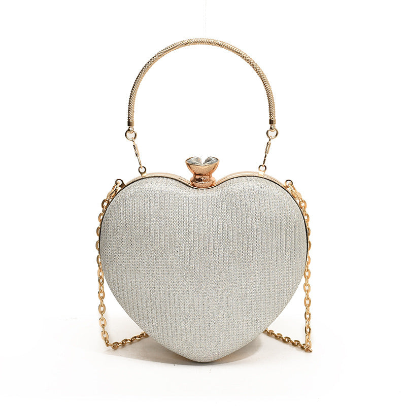 Clutch de noche glamuroso con forma de corazón