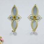 Espejo de pared floral elegante con diseño decorativo de metal