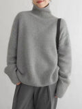 Jersey de cuello alto de cachemir para mujer