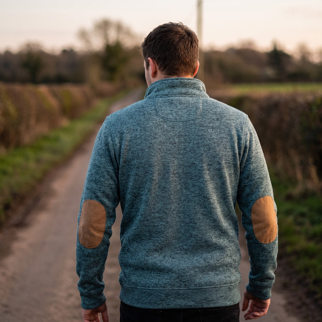 Jersey de punto con cuello alto y botonadura para hombre