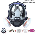 Máscara respiratoria completa con visor transparente y cartuchos de filtro intercambiables