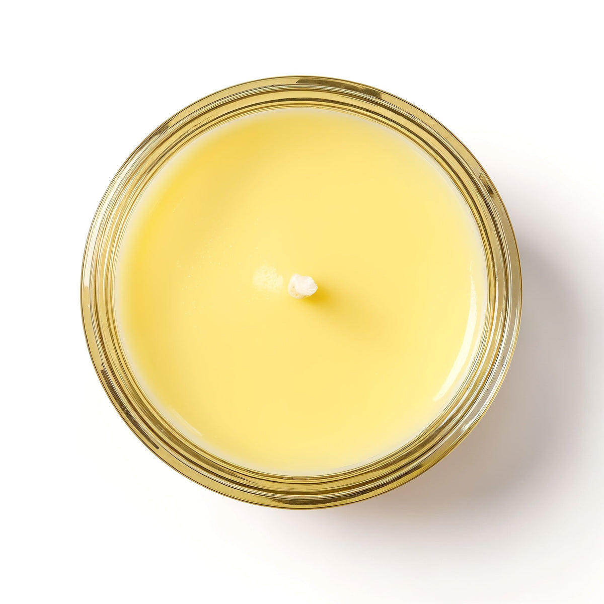 Vela de soja Citrus Zest de Tiendalodama en tarro de cristal amarillo