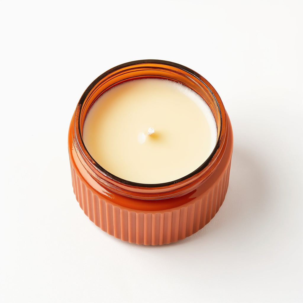 Vela de soja Ginger Spice de Tiendalodama — Tarro naranja con textura acanalada