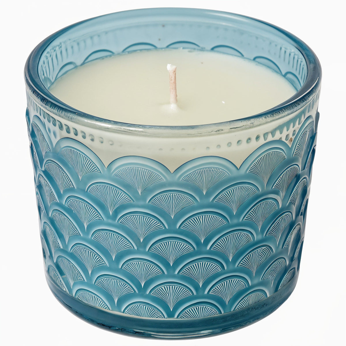 Vela de soja Ocean Mist de Tiendalodama en tarro de cristal azul con patrón de olas