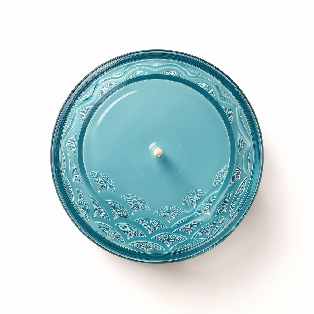 Vela de soja Ocean Mist de Tiendalodama en tarro de cristal azul con patrón de olas